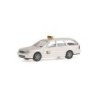 Model redukcyjny FORD Mondeo Turnier "Taxi Roma", skala 1:87. Biały samochód z sygnalizacją, logo Taxi-Ambulances.