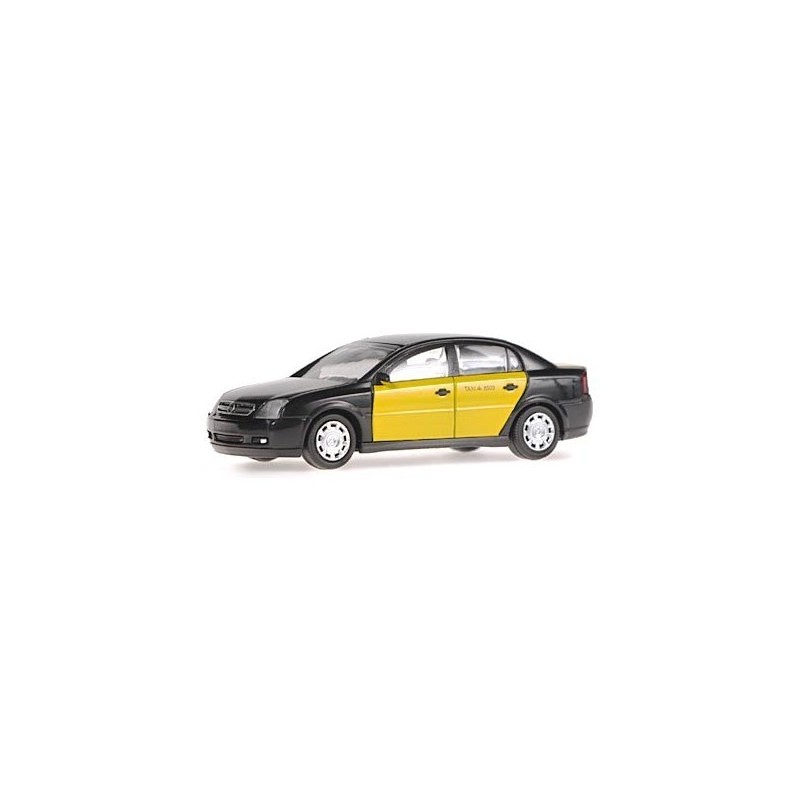 Opel Vectra Taxi Barcelona, skala 1:87, model redukcyjny. Czarno-żółty lakier, detale taksówki barcelońskiej.