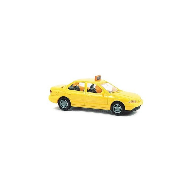 Model redukcyjny FORD Mondeo Taxi, skala 1:87, żółty.