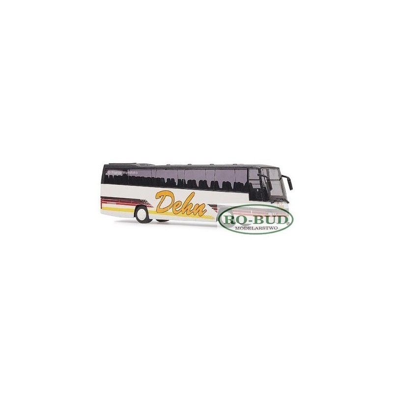 Model redukcyjny autobusu Volvo B12-600 Dehn, skala 1:87, biały z czerwono-żółtymi pasami i napisem Dehn.