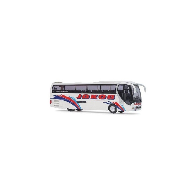 Model redukcyjny MAN Lions Star 2001, skala 1:87, Jakob-Reisen. Biały autobus z czerwono-niebieskimi pasami i napisem "JAKOB".