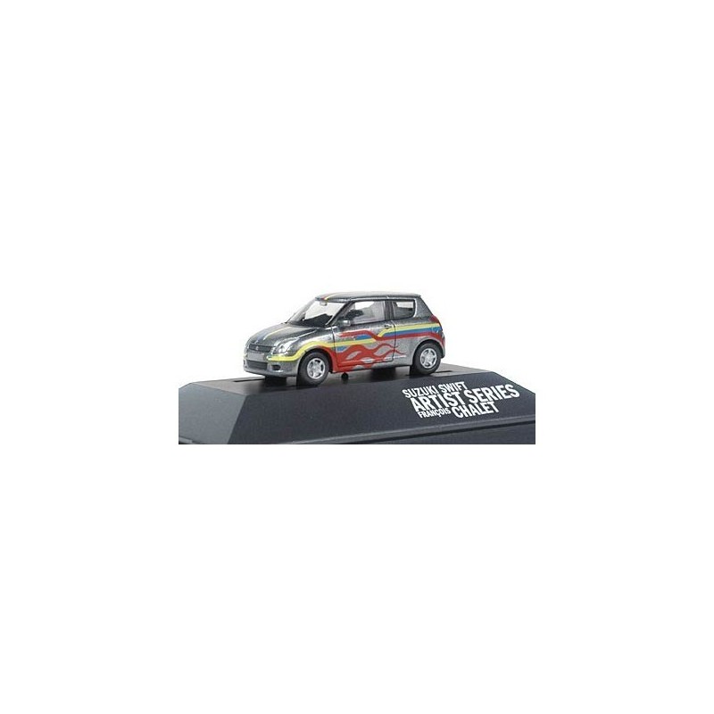 Suzuki Swift Artist Series Francois Chalet, 1:87, kolor szary z czerwono-żółtymi pasami.