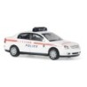 Opel Vectra Limousine policyjny, skala 1:87, czerwono-białe malowanie, detale policyjne.