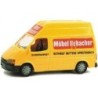 Model redukcyjny FORD Transit, skala 1:87, Möbel Hubacher. Żółty van z czerwonym logo.