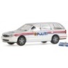 Model redukcyjny FORD Mondeo Turnier Politi, skala 1:87, biały z czerwono-niebieskimi pasami i logo policji.