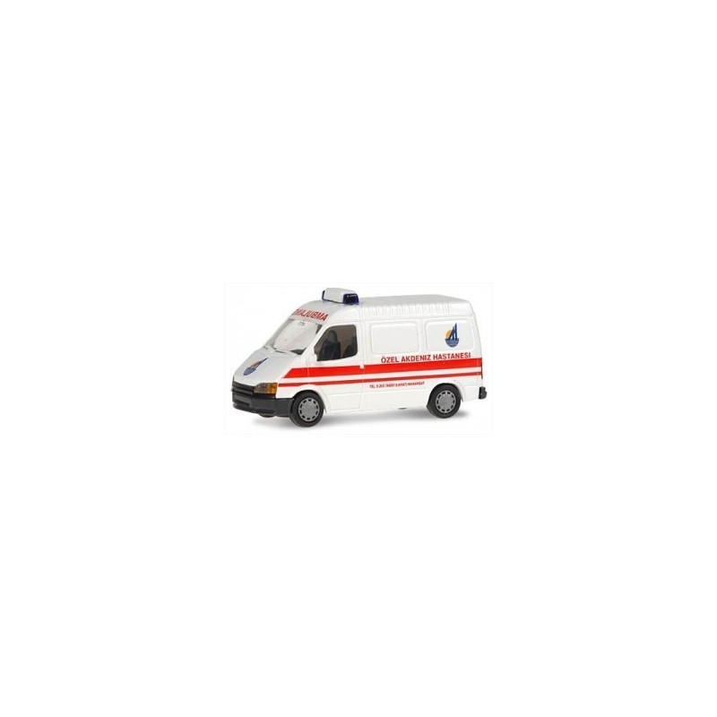 Model redukcyjny FORD Transit Ambulance, skala 1:87. Biały z czerwonymi pasami i napisami.
