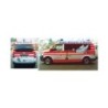 Model redukcyjny Volkswagen T5 Baby-NAW 'DRK Babynotarzt, Reutlingen', skala 1:87. Czerwono-biały samochód z napisem Baby-Notarz