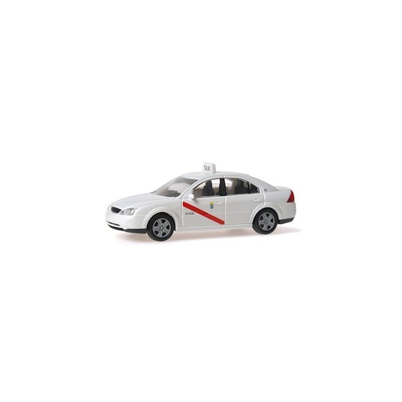 Model redukcyjny FORD Mondeo Taxi Madrid, skala 1:87. Biały samochód z czerwonym paskiem i tablicą TAXI.
