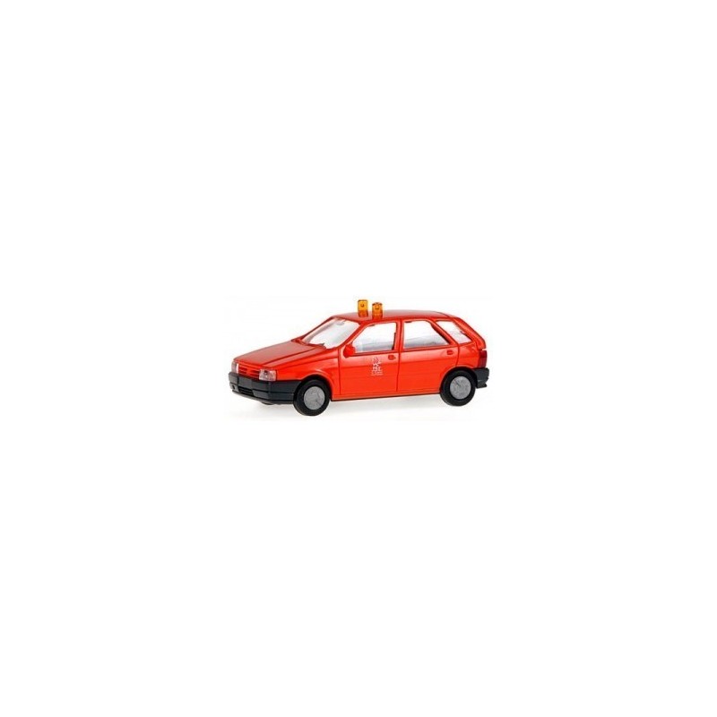 Model redukcyjny FIAT Tipo Met, skala 1:87. Czerwony samochód z białymi oznaczeniami.