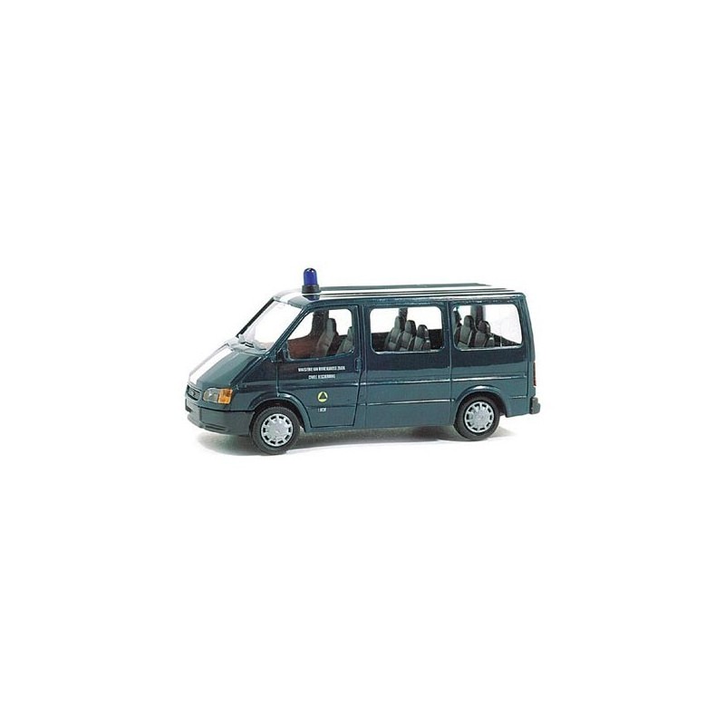 Model redukcyjny FORD Transit Zivilschutz, skala 1:87. Zielony van z sygnałem świetlnym, logo i napisami.