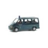 Model redukcyjny FORD Transit Zivilschutz, skala 1:87. Zielony van z sygnałem świetlnym, logo i napisami.