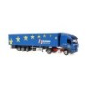 IVECO Stralis, skala 1:87, Hövelmann Logistik. Niebieska ciężarówka z naczepą w gwiazdach, logo logistyczne.