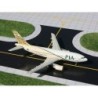 Model redukcyjny Airbus A310, skala 1:400, GeminiJets. Malowanie PIA, biały kadłub z zielonymi akcentami i kolorowym ogonem.