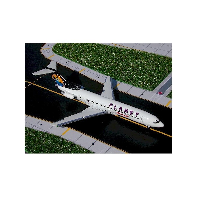 Model redukcyjny Boeing 727-200, skala 1:400, GeminiJets. Biały kadłub z napisem "PLANET" fioletowym kolorem.