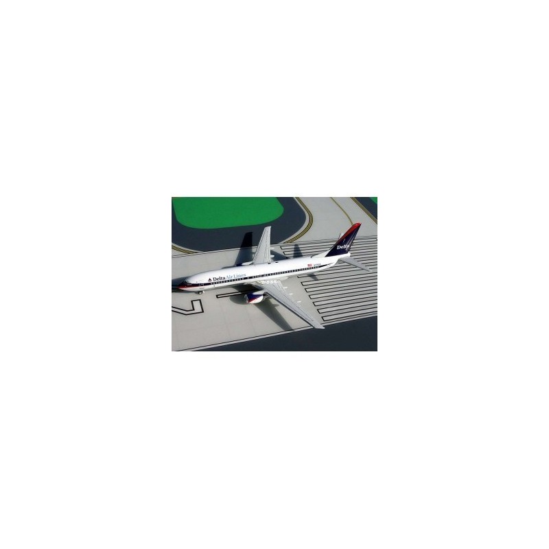 Model redukcyjny Boeing 737-800 Delta, skala 1:250. Biały kadłub, czerwono-czarne elementy, logo linii Delta.