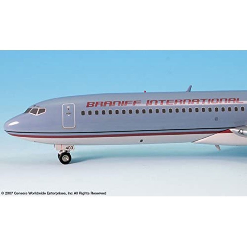 Model samolotu Braniff International Boeing 727-200, skala 1:200. Szary kadłub z czerwonymi napisami i czerwono-błękitną linią p