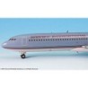 Model samolotu Braniff International Boeing 727-200, skala 1:200. Szary kadłub z czerwonymi napisami i czerwono-błękitną linią p